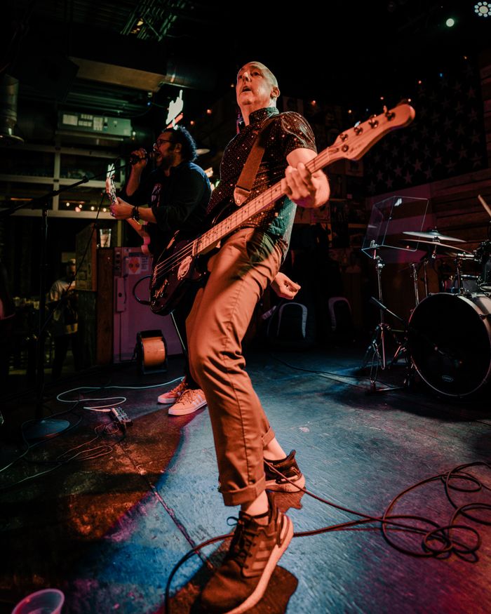 Energetic live band performance on stage in Orlando, showcasing vibrant music and passionate musicians.